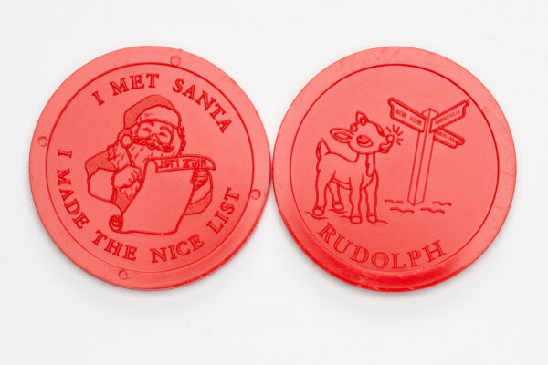 Red Or Green Plastic  Give-Away Token - Embossed "I Met Santa - I Made The Nice List" / Rudolph On Back